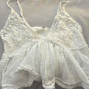 A fluffy white tank top from buckle.